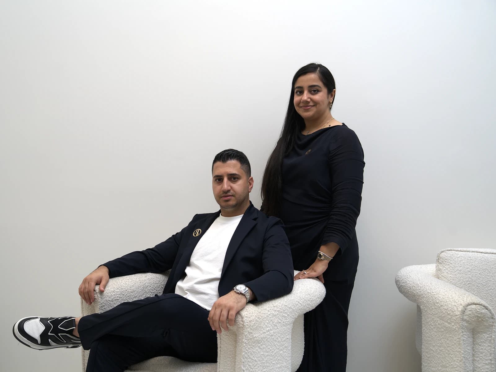 The owners of SASO Watch at the showroom